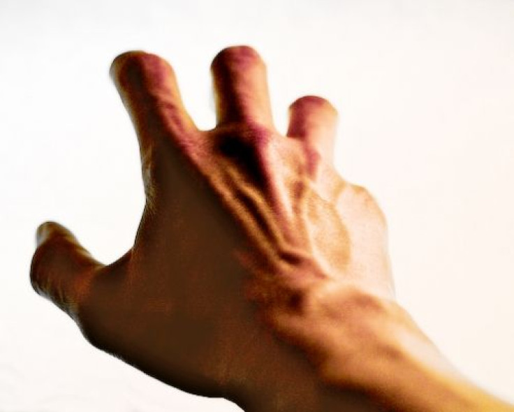 Right-handers, but not left-handers, are biased to select their dominant hand