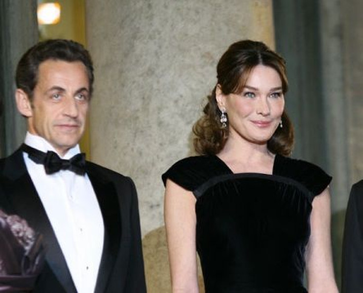 France President Nicolas Sarkozy and First Lady Carla Bruni-Sarkozy at a dinner of State in honor of M. Michel Sleiman President of Lebanon on March 16, 2009.