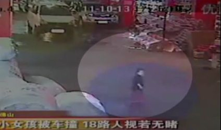 An image from the surveillance video that captured the hit and run accident of a toddler in China on October 13, 2011.