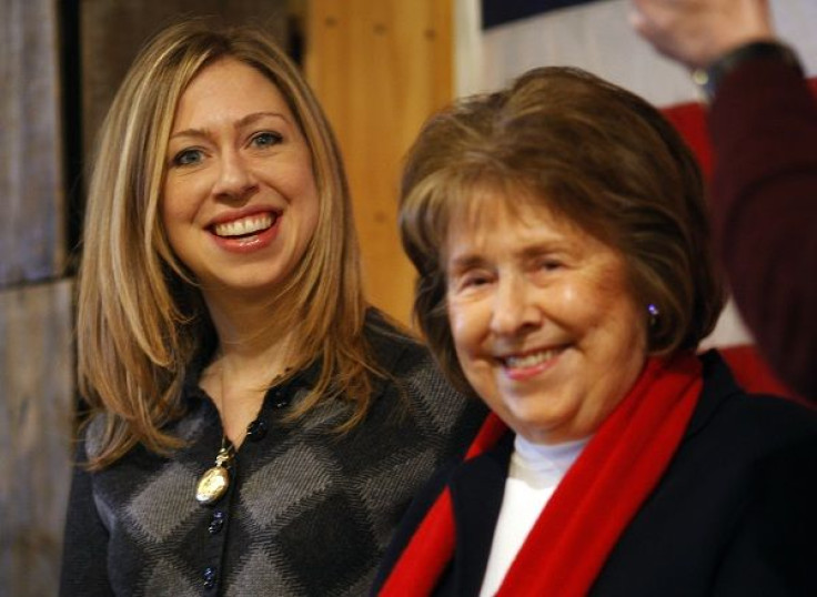 Chelsea Clinton (L) and her grandmother Dorothy Rodham (R) listen as Democratic presidential candidate U.S. Senator Hillary Clinton (D-NY) speaks to voters in Concord, New Hampshire December 21,2007.