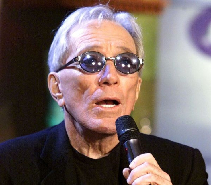 Singer Andy Williams sings his signature song &quot; Moon River&quot; during a rehearsal of the &quot; Donny & Marie Show &quot; in Los Angeles, March 24.