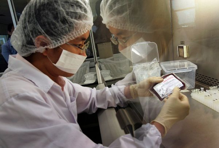 A biotechnologist processes cord blood samples to be cryopreserved at a Singapore laboratory August 26, 2005. Since 1988, stem cells have been used to treat an increasing number of diseases, including blood and metabolic disorders, immuno-deficiency ailme