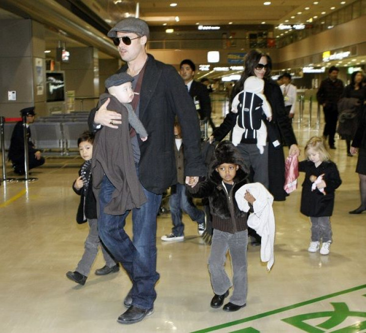 U.S. actors Brad Pitt and Angelina Jolie arrive with their children at Narita airport, near Tokyo, January 27, 2009.