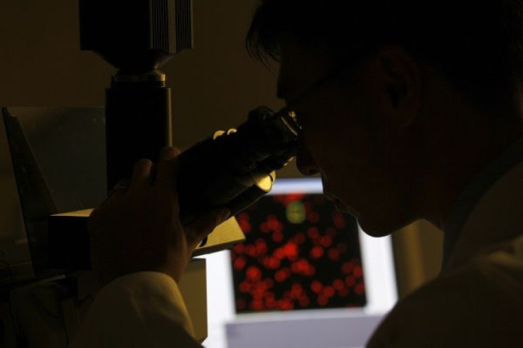 Ronald Li, director of the University of Hong Kong's Stem Cell & Regenerative Medicine Consortium, poses after an interview with Reuters in Hong Kong August 15, 2011.