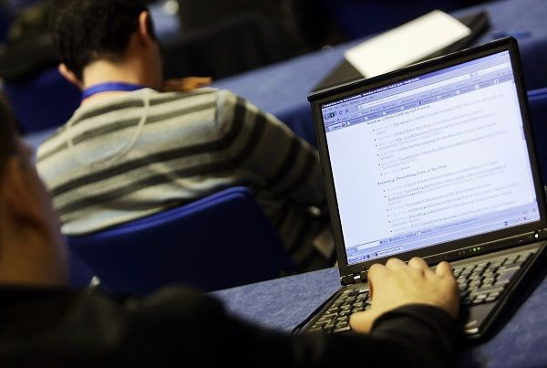 People attend a workshop on the first day of the 18th World Wide Web Conference in Madrid April 20, 2009.