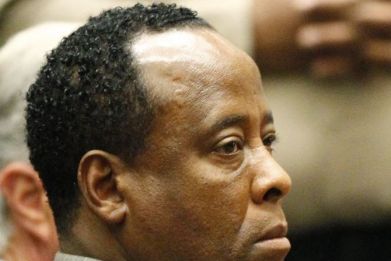 Dr. Conrad Murray (C) remains expressionless as the jury returned with a guilty verdict in his involuntary manslaughter trial in Los Angeles November 7, 2011. Murray was found guilty on Monday of involuntary manslaughter in the pop star's death. REUTERS/Al Seib/Pool
