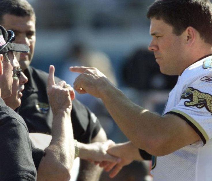 Jaguar team doctor, Dr David Murray works hand and eye coordination exercises with Jaguar quarterback Mark Brunell after he took a shot to the head