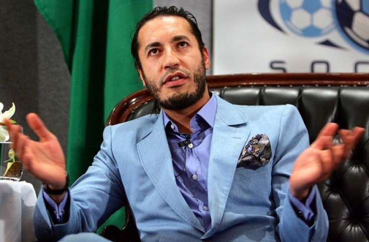 Al Saadi Gaddafi, the third son of Libyan leader Muammar Gaddafi, reacts to a question at a news conference in Sydney. Al Saadi Gaddafi, the third son of Libyan leader Muammar Gaddafi, reacts to a question at a news conference in Sydney February 7, 2005.