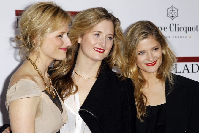 Daughters of cast member Meryl Streep arrive for the New York premiere of their mother's film "The Iron Lady" in New York