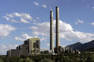 Smoke stacks are seen at Pacificorp's Huntington Power Plant in Huntington, Utah August 11, 2007. Pacificorp's Huntington Plant and its Deer Creek Mine share the same canyon road with the Crandall Canyon mine where rescue efforts to save six trapped coal miners continue.