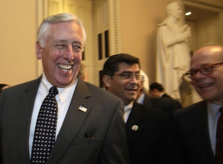 House Minority Whip Steny Hoyer (D-MD) (L) smiles after the House vote on the payroll tax cut extension on Capitol Hill in Washington December 23, 2011.