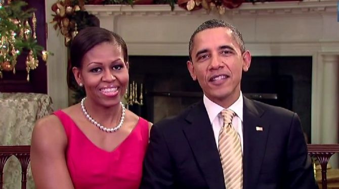 President Barack Obama is joined by First Lady Michelle Obama