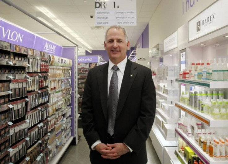 Greg Wasson, CEO of Walgreens, poses in a newly opened Duane Reade store in New York February 17, 2010.