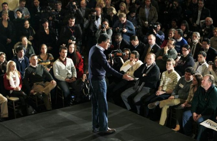 Republican presidential candidate Mitt Romney speaks to supporters at a campaign rally in Des Moines, Iowa January 3, 2012, the day of the Iowa caucus.