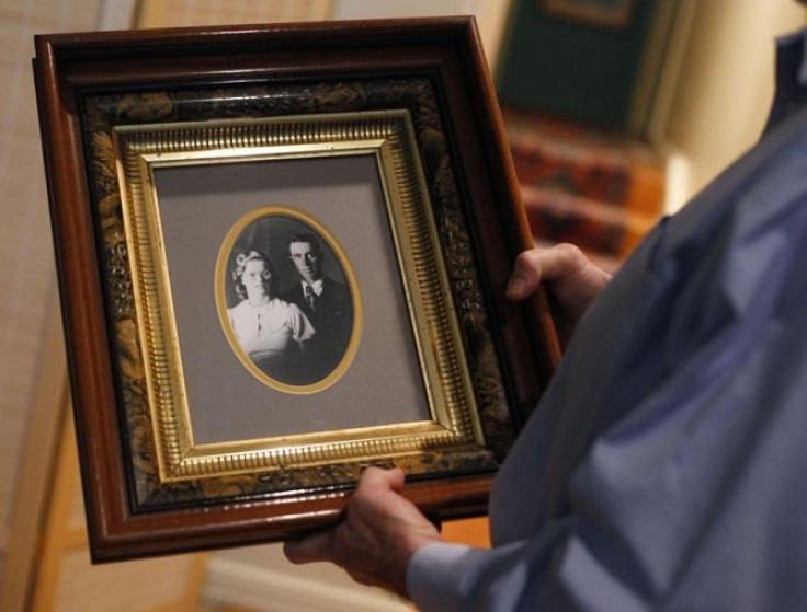 Gary Reiswig holds a portrait of his parents Fred and Della from 1934 at his apartment in New York July 13, 2011.