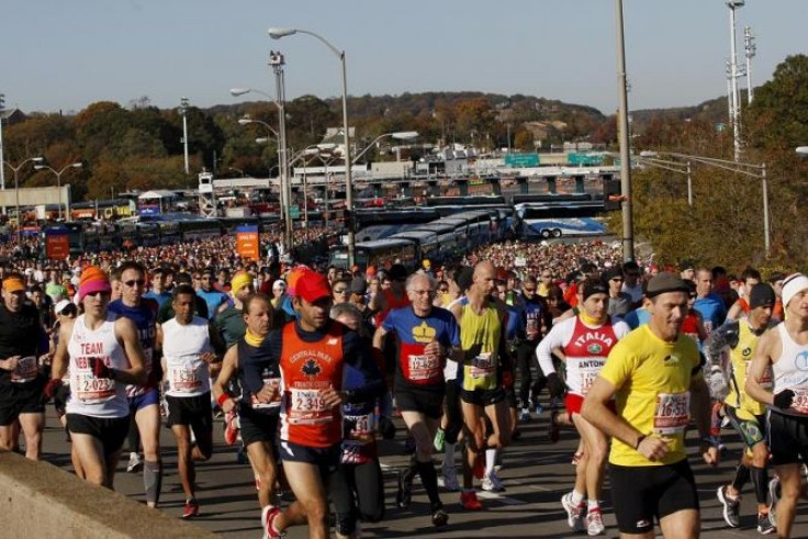 Runners leave from the start of the 2011 New York City Marathon in New York, November 6, 2011.