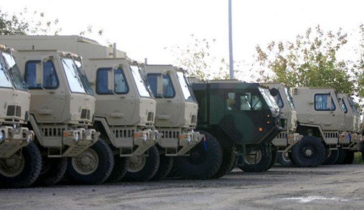 Large military vehicles are seen at the Oshkosh plant in Wisconsin October 12, 2011.
