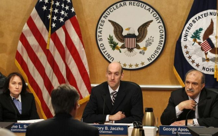U.S. Nuclear Regulatory Commission (NRC) Chairman Gregory Jaczko (C) is joined by commissioners Kristine Svinicki (L) and George Apostolakis (R) as they listen to R. William Borchardt testify about Japan's nuclear problems at a meeting at the NRC's headqu