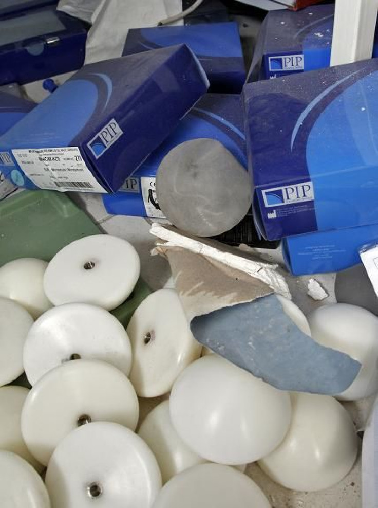 Molds used to manufacture silicone gel breast implants by the now defunct French company Poly Implant Prothese (PIP) are seen near boxes of implants inside an abandoned PIP building in La Seyne-sur-Mer near Toulon December 28, 2011