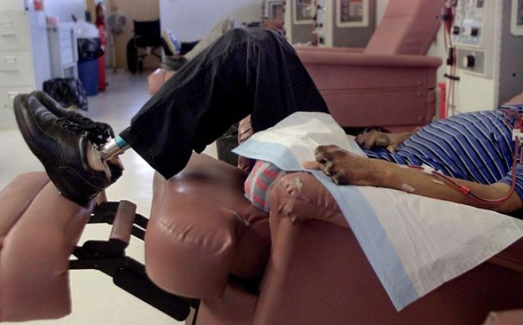 His body showing the ravages of diabetes Paul Rooks, 49, lies on an easy chair while receiving dialysis in the Porcupine Clinic on the Pine Ridge Indian Reservation in South Dakota.