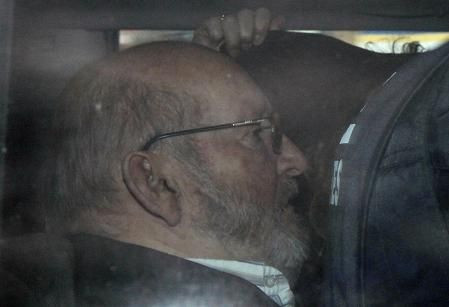 Jean-Claude Mas, whose breast implant firm Poly Implant Prothese (PIP) has sparked an international health scandal by using substandard silicone, is seen as he arrives at the gendarmerie in Marseille January 26, 2012.