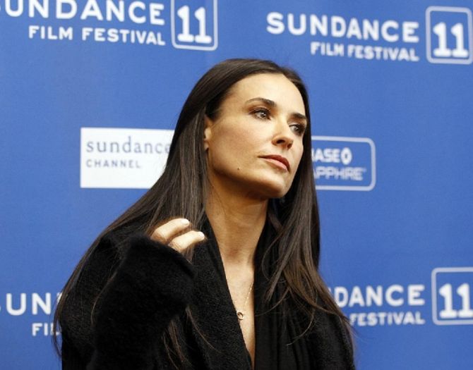 Demi Moore Poses with Daughter Scout in Stylish Red Carpet Appearance