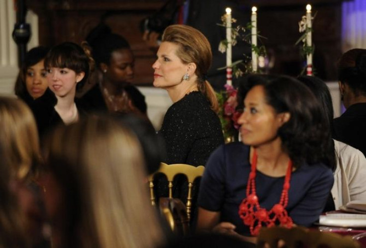 Nancy Brinker (C), founder and chief executive of Susan G. Komen for the Cure, and actress Tracee Ellis Ross (R) attend a dinner celebrating Women's History Month at the White House in Washington March 30, 2011.