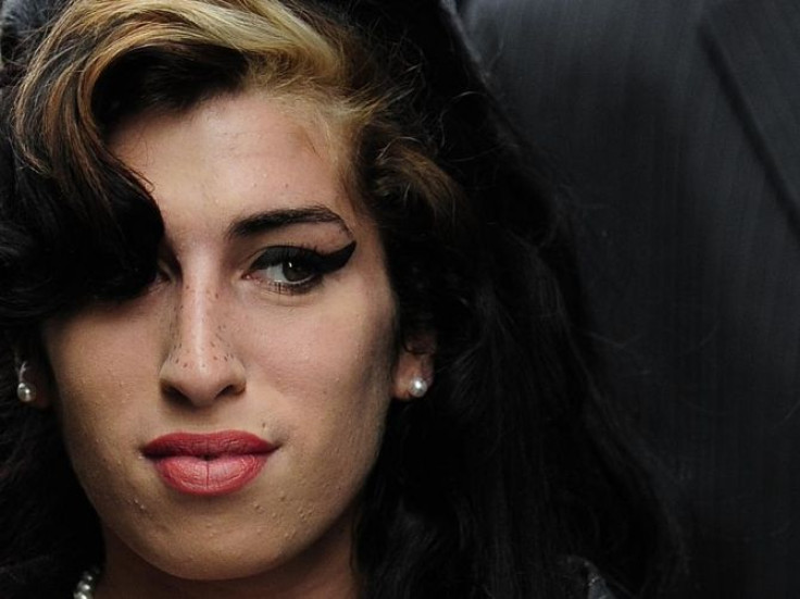 British singer Amy Winehouse arrives at Westminster Magistrates Court in central London July 23, 2009.