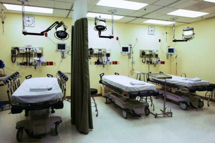 Beds lie empty in the emergency room of Tulane University Hospital in New Orleans February 14, 2006.