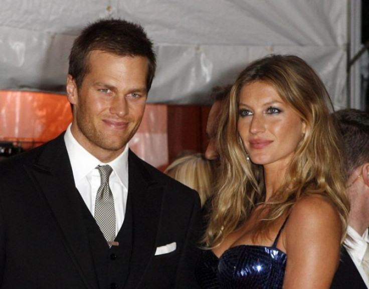 New England Patriots quarterback Tom Brady and his wife model Gisele Bundchen.