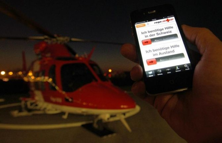 A spokesperson of Swiss air rescue (REGA) shows the new &quot;iRega&quot; iPhone rescue application at Zurich Airport in Kloten, February 8, 2011.