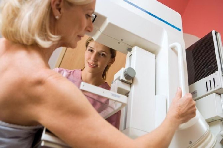 A woman getting a Mammography