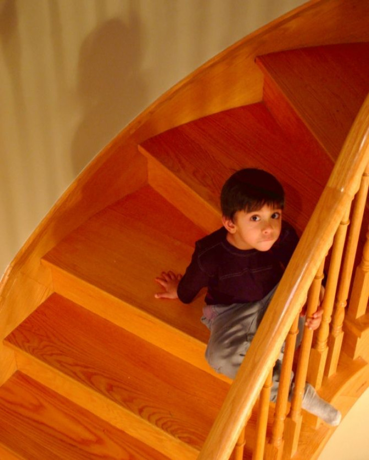 A boy on the stairs.