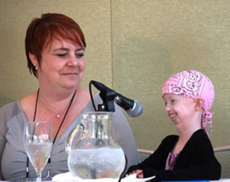 Twelve-year-old Hayley Okines (r) and her mom, Kerry, during the family panel