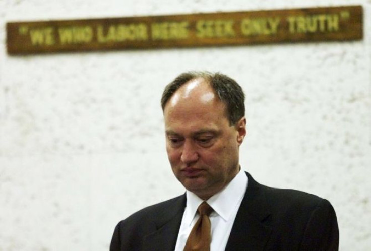 Michael Szymanczyk, President and CEO of Philip Morris USA, stands at the witness box during a court break in Miami as he testifies during the punitive damages phase of the Florida tobacco trial in 2000 in Miami.