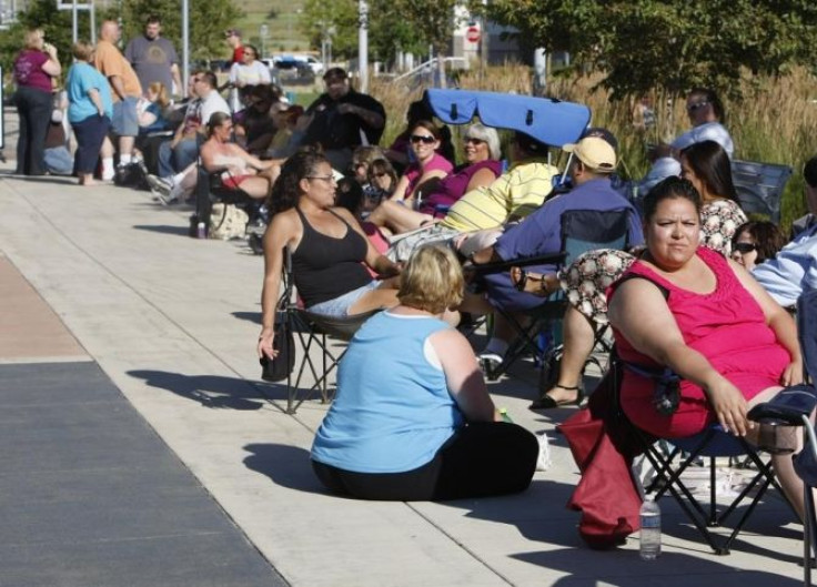 People wait in line at an open casting call for the 11th season of &quot;The Biggest Loser&quot; television show in Broomfield, Colorado July 17, 2010.