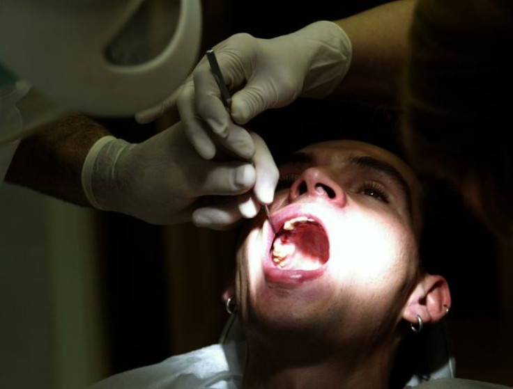 Dentist with Male Patient