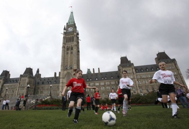 An under-10 girls soccer team plays a friendly match on Parliament Hill in Ottawa