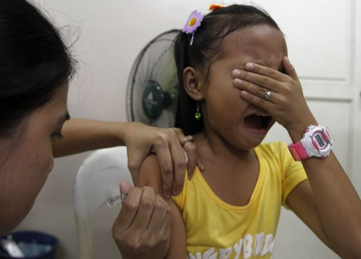 girl getting vaccination