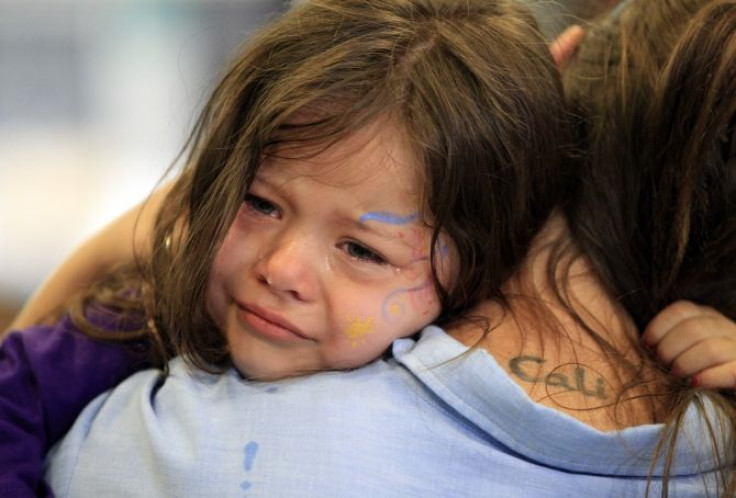 crying child with mother