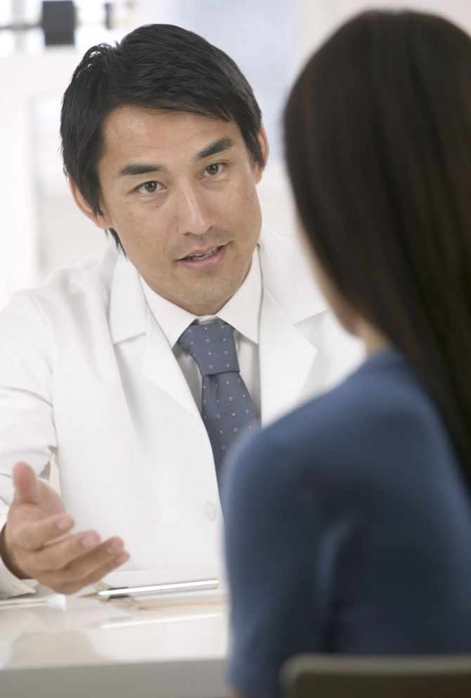 Doctor talking to patient