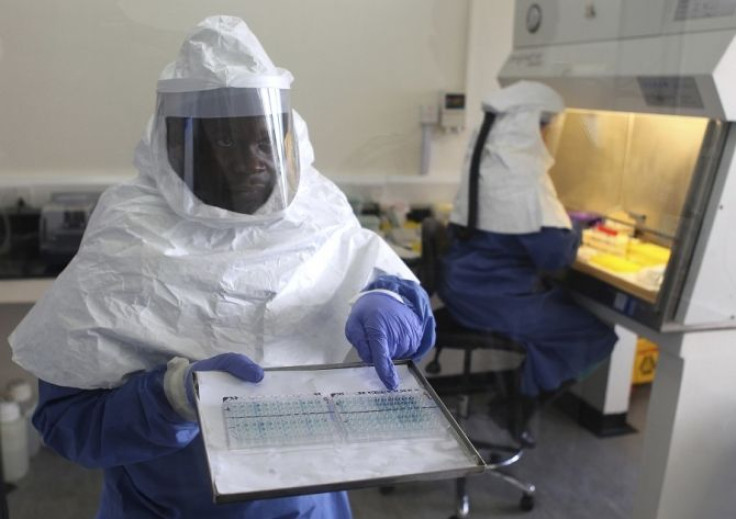 A doctor displays collected samples of the Ebola virus at the Centre for Disease Control in Entebbe, about 37km (23 miles) southwest of Uganda's capital Kampala, August 2, 2012. Residents in western Uganda said on Thursday they were too scared to go shop