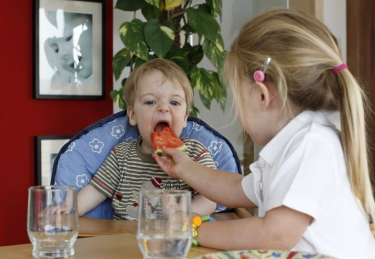 Child Eating Fruit