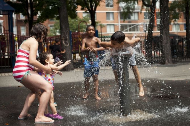 Children playing in fountain