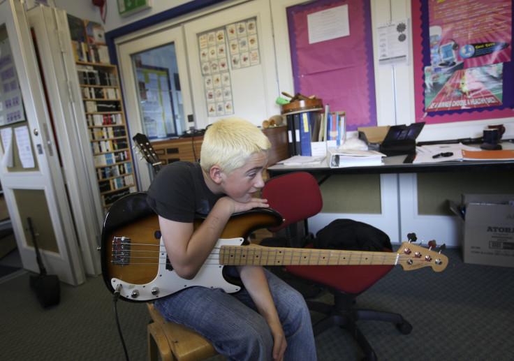 Boy with guitar.