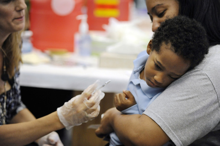child receiving vaccine