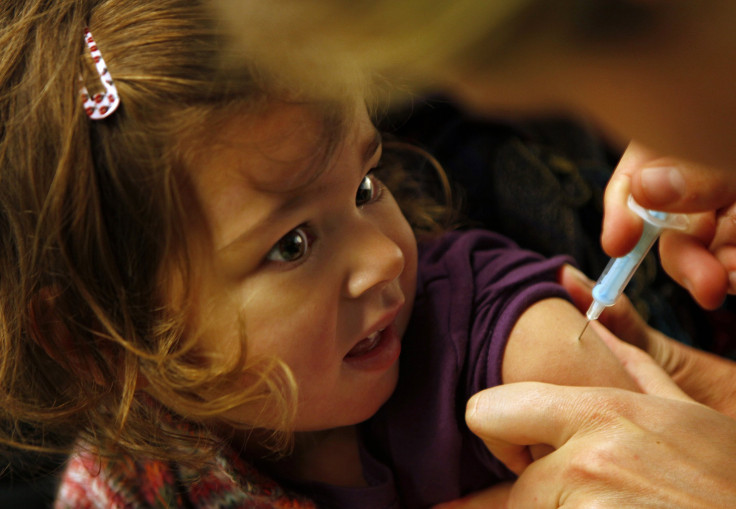 child getting vaccine shot