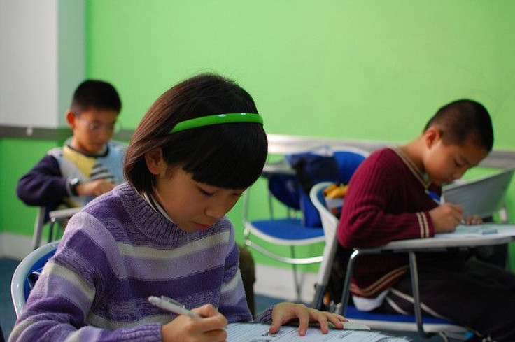 Children taking an exam.