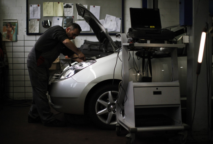 mechanic working on a car