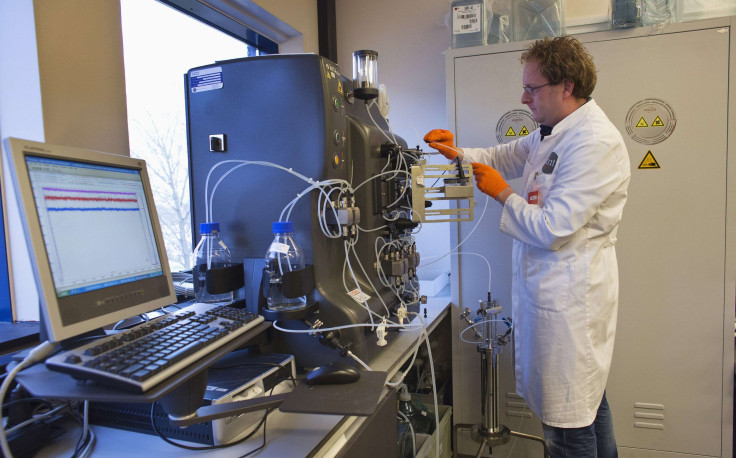 operator installs a chromatography column to purify the gene therapy drug Glybera